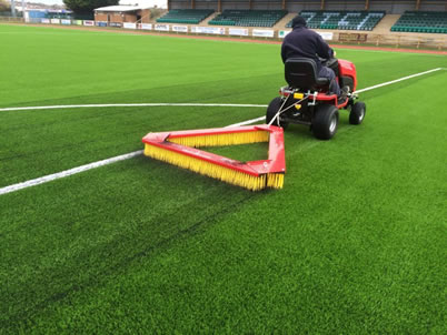 Drag brush for artificial grass pitch maintenance