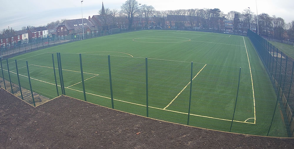 Full-size floodlit FIFA Quality and World Rugby Approved artificial grass pitch at Stockport School - Pitch construction by PST Sport