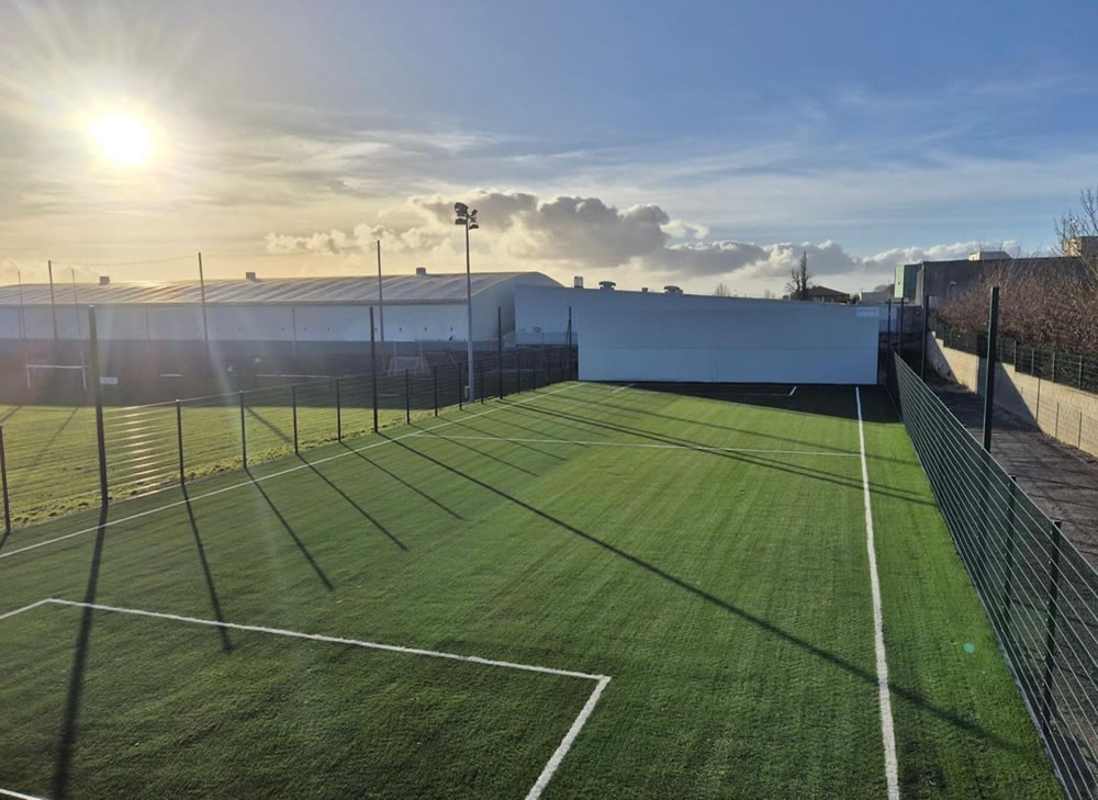 Artificial grass training pitch with ball wall at St Nicholas GAA in Drogheda, County Louth. 