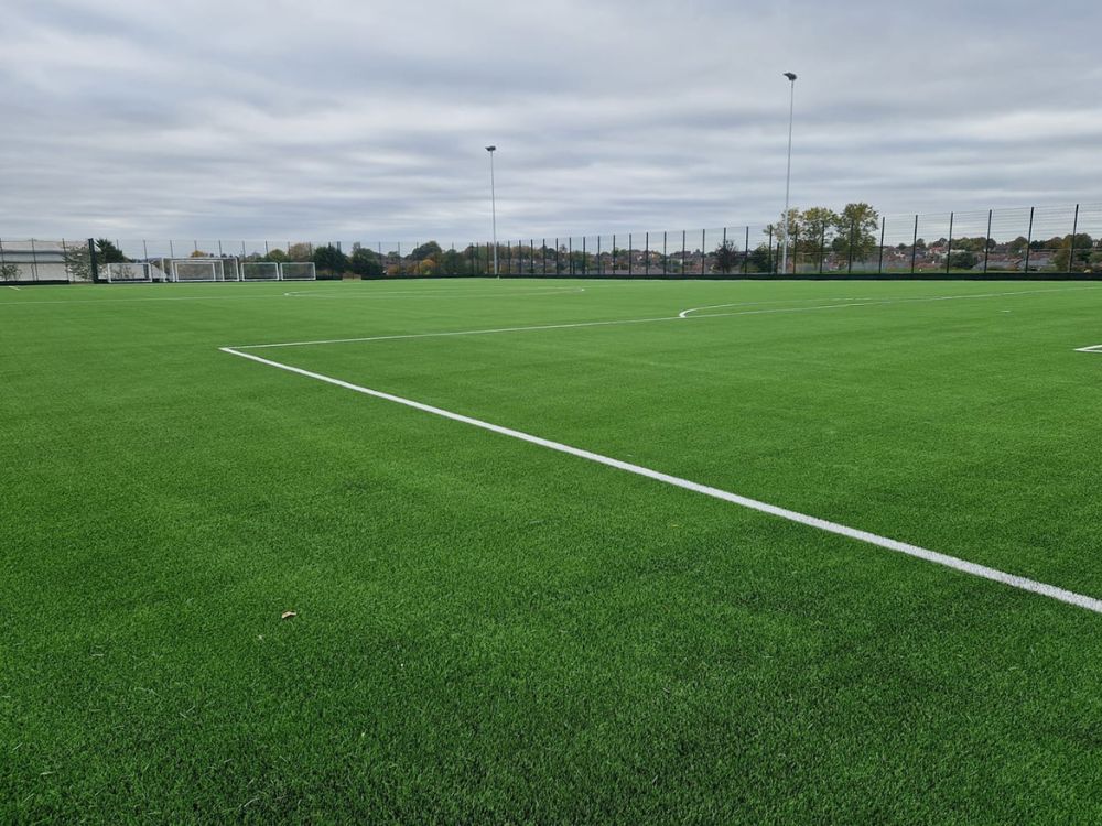 5,900 sq/m FIFA Quality artificial grass pitch at Kettering Buccleuch Academy in Northamptonshire. Pitch resurface by PST Sport